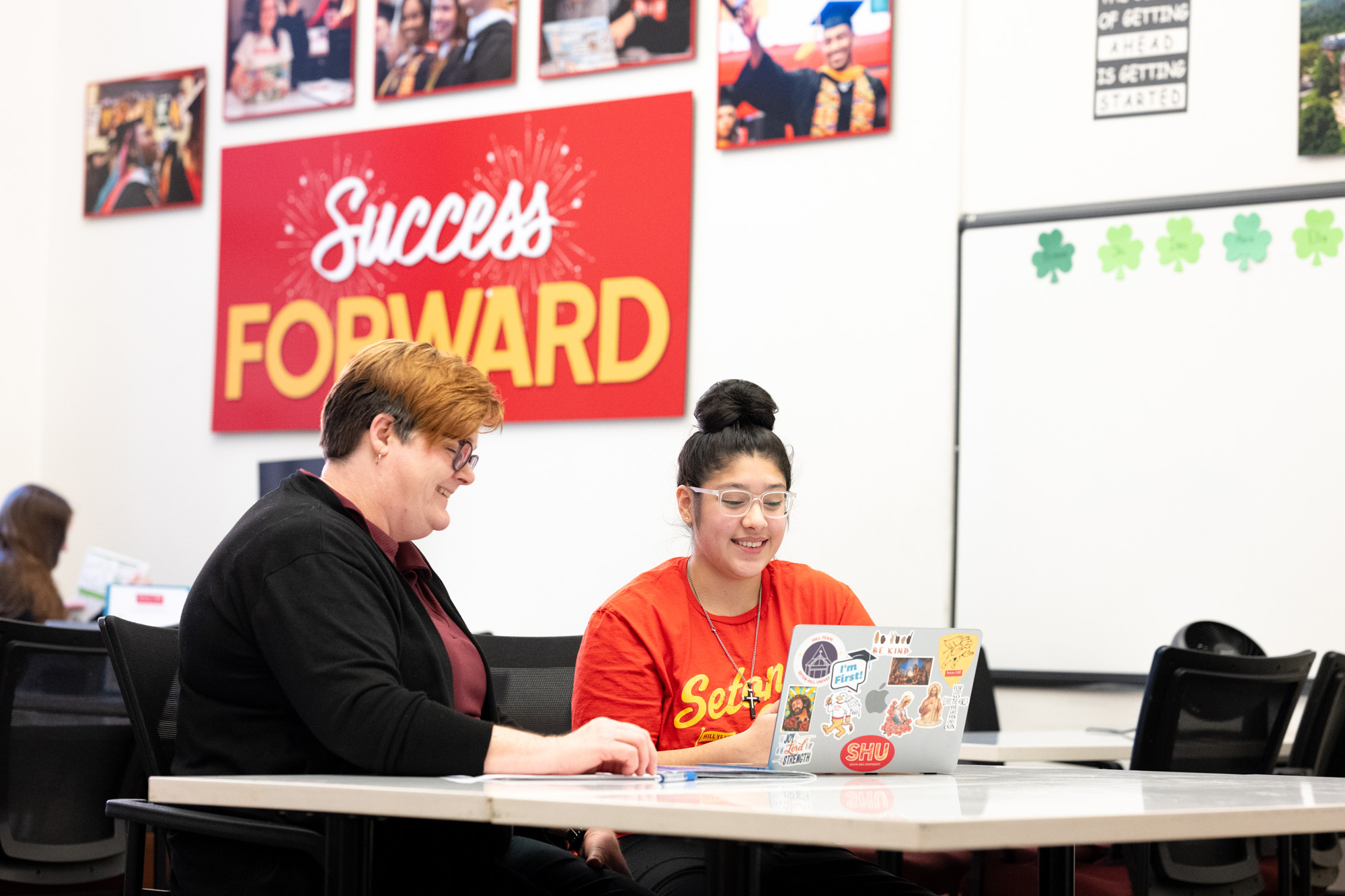Academic Counselor working with a SHU Student